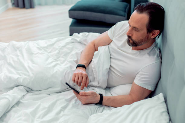 istock Beginning the day with browsing the Internet in modern gadget 1281961450