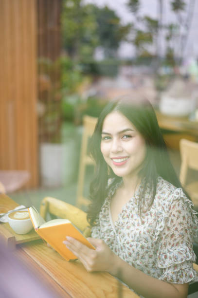 istock A young beautiful woman is working in coffee shop 1281961861