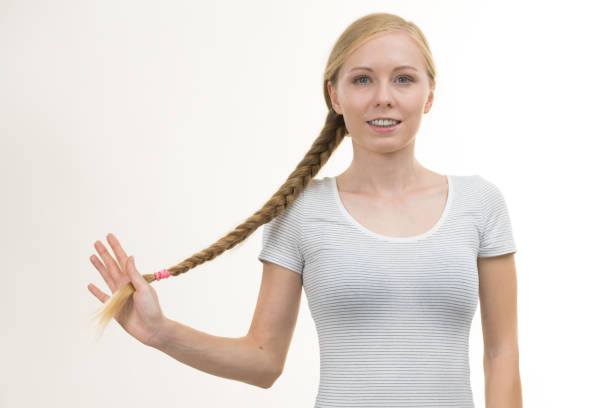 istock Blonde girl with long braid hair 1281961998