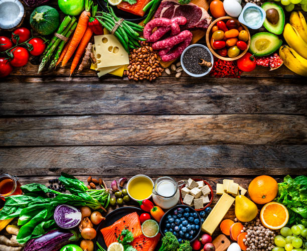 istock Food background on rustic wooden table. Copy space 1281962966