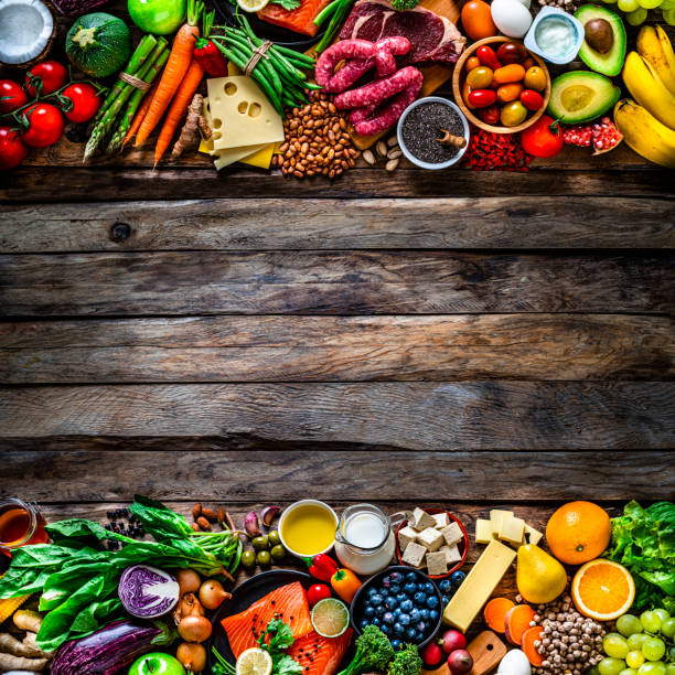 istock Food background on rustic wooden table. Copy space 1281962967