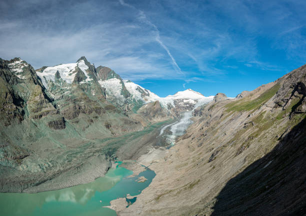 istock Grossglockner summit and massif mirroring in turquoise glacier lake 1281963140