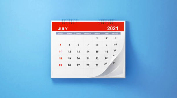 istock 2021 July Calendar On Blue Background 1281964270