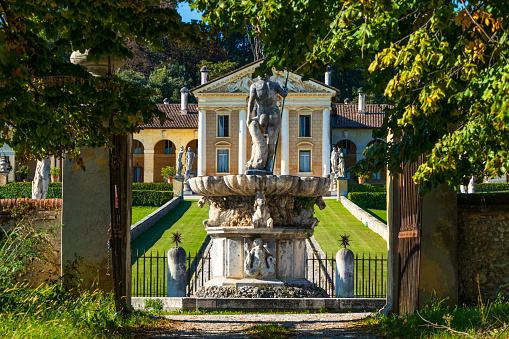 Maser, Italy - Octoberber 08, 2020: Villa Barbaro, designed by Andrea Palladio (1554-1560). Although only the side wings are to be attributed to the famous Venetian architect, the villa is joined the UNESCO World Heritage Site in 1996, together with other Palladian Villas of the Veneto.