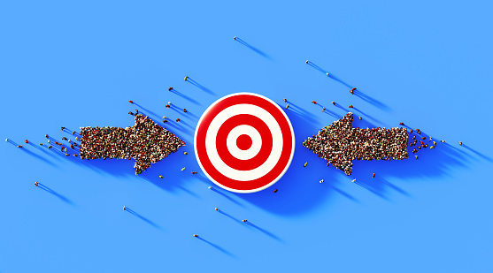 Human crowd forming two arrow symbols around a red bulls eye on blue background. Horizontal composition with copy space. Marketing and target audience concept
