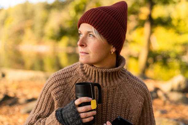 istock Drinking Tea and Enjoying Nature in Autumn 1281966390