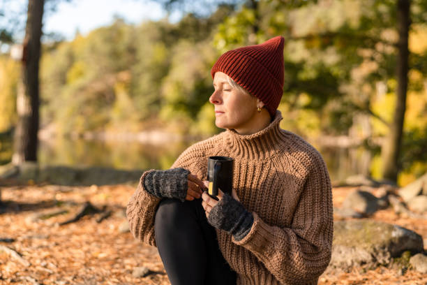 istock Drinking Tea and Enjoying Nature in Autumn 1281966412