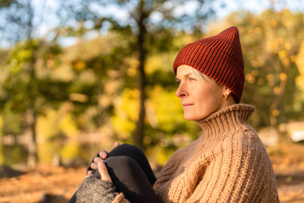 istock Woman enjoying the sunlight in Autumn 1281966467