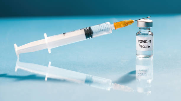 istock Coronavirus vaccine with syringe 1281967623