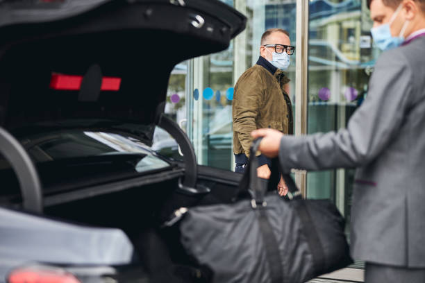 istock Male tourist in a face mask looking ahead 1281969284