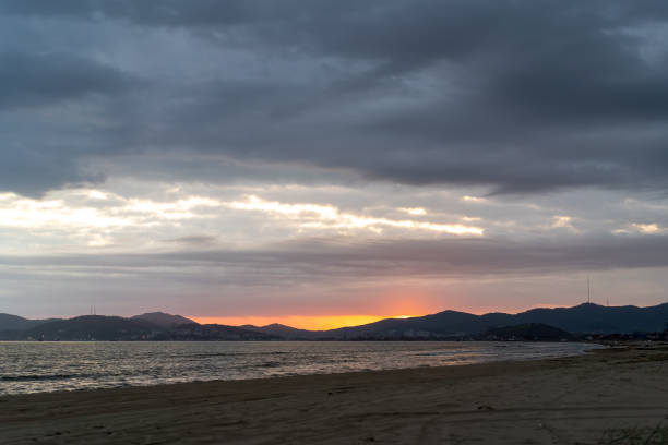 istock Seascape with beach and sunset views. 1281971588