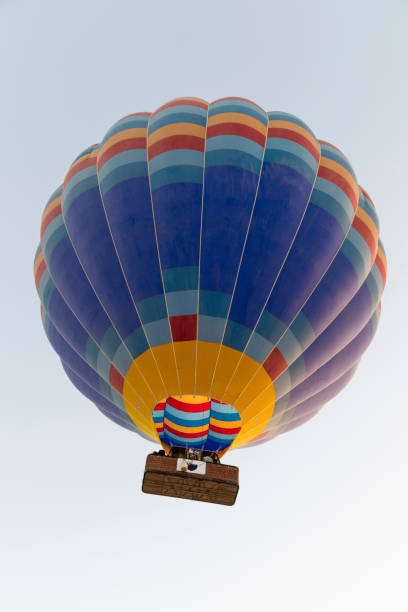 Hot air baloon rising up in the morning