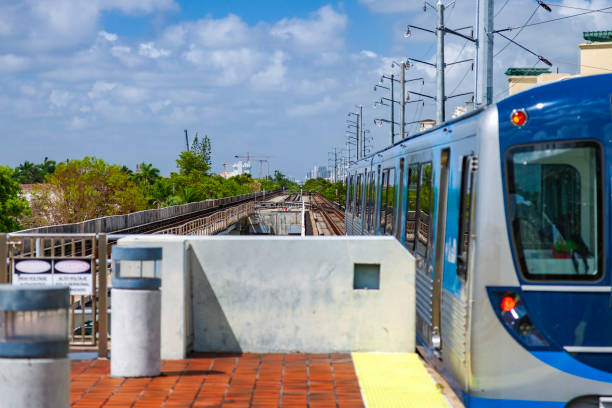 istock Heading downtown, this commuter train departs a station for Miami Florida 1281990837