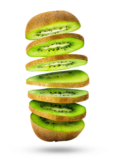 istock Fresh sliced kiwi fruit flying in the air isolated on white. 1281991095