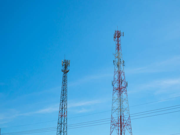 istock Telephone tower On the background is a bright blue sky. 1281991958
