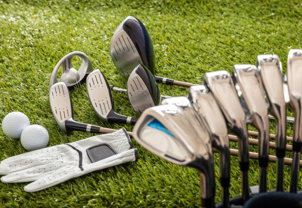 istock Golf equipment on green grass golf course, close up view. 1281992314