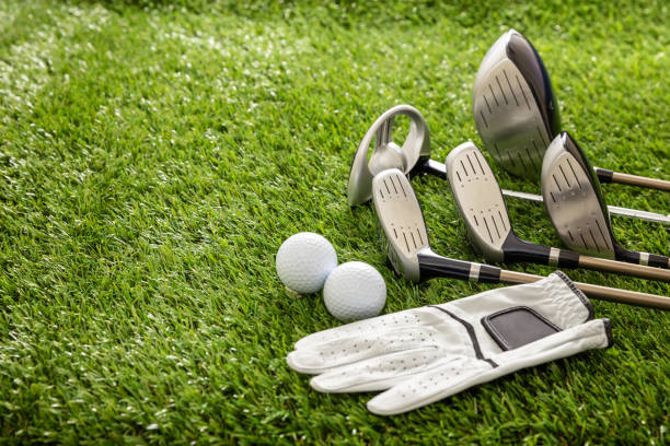 istock Golf equipment on green grass golf course, close up view. 1281992323