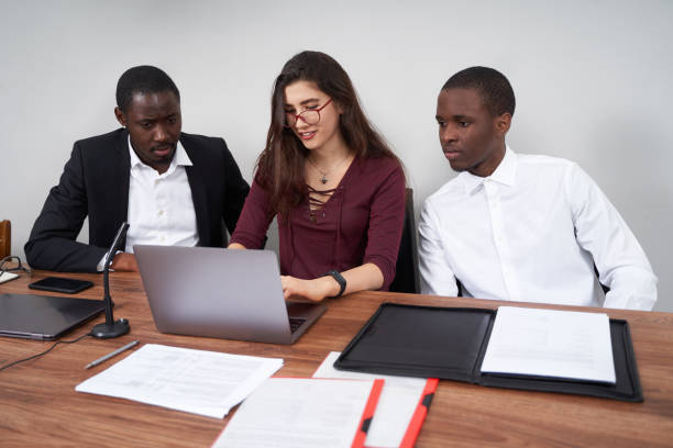 istock Young happy business people working together in modern office, multiethnic teamwork 1281992440