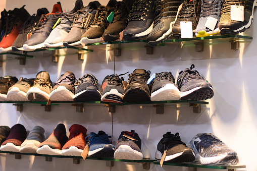 Close up image of Mens shoe in store , shoe displayed in footwear store.