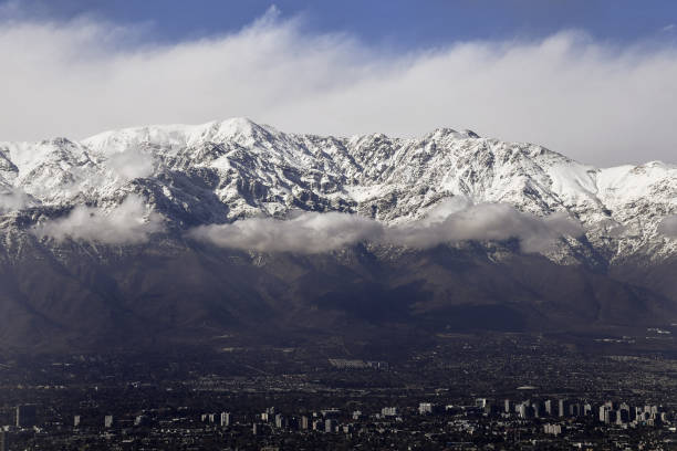istock Snow-Capped Andes Mountains Towering behind Santiago, Chile 1281993836