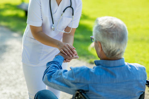 istock Caregiver is consoling her patient 1281997140