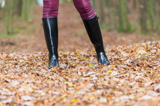 istock black women's boots in the autumn landscape 1281997154