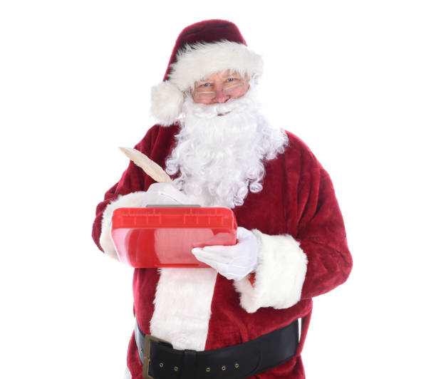 산타 클로스는 자신의 장난 꾸러기 좋은 목록에 메모를 만드는 aqill 펜을 들고 클립 보드를 들고. 흰색으로 분리됩니다. - 5576 뉴스 사진 이미지