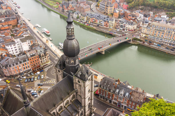 Image of the gothic collegiate church of Notre Dame and cityscape of the city of Dinant, Belgium
