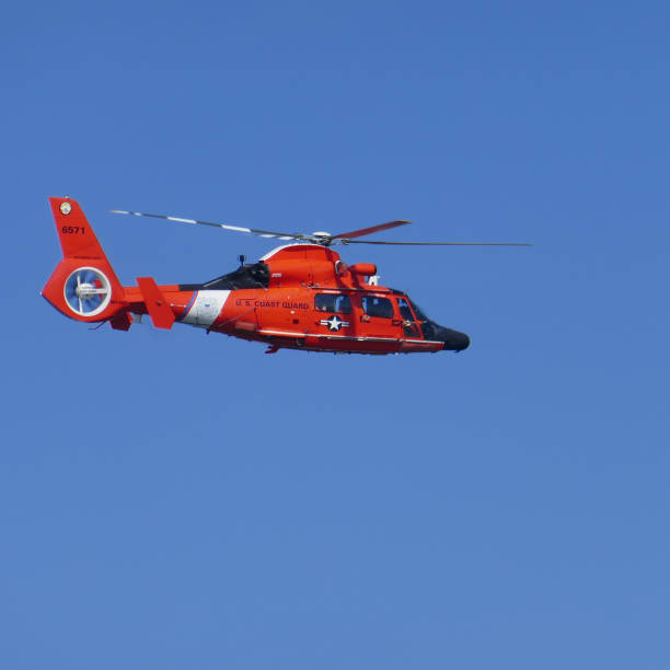 US Coast Guard Helicopter flying over Manhattan stock photo