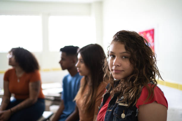 istock Portrait of a female student in the classroom 1282009872