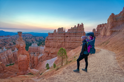 Mother and daughter taking in the breathtakingly beautiful scenery of Bryce Canyon National Park in southern Utah.