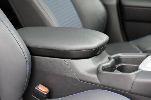 istock Armrest in the luxury passenger car between the front seats 1282010998