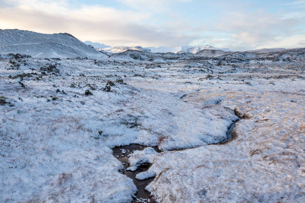 istock water stream in in winter landscape 1282011219