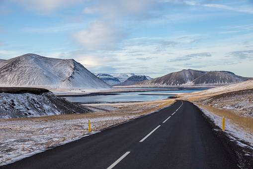Beautiful shot of a highway in a snowy mountain landscape in Snaefellsnes, Iceland