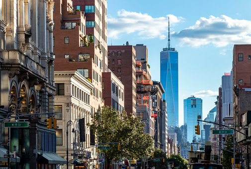 View of the historic buildings along 6th Avenue towards downtown Manhattan in New York City NYC