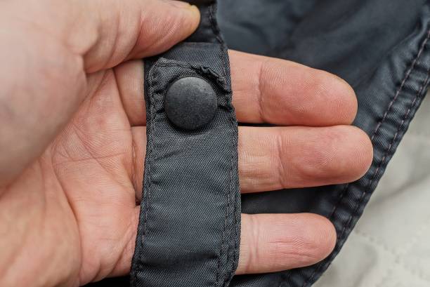 istock hand holds a black harness made of fabric with plastic rivet 1282015080