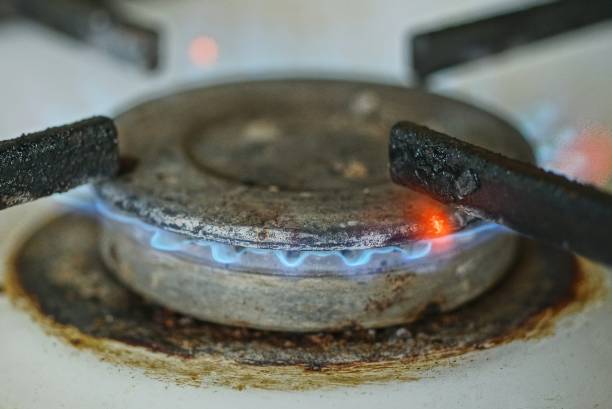istock one gray round metal burner with a burning blue flame 1282015087