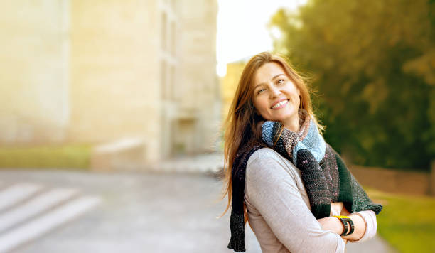 istock Happy smiling woman looks into the frame. 1282015375