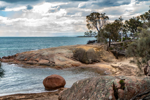 Honeymoon Bay, Freycinet National Park at Freycinet Peninsula Tasmania, Australia Tasmania, Australia. honeymoon bay stock pictures, royalty-free photos & images