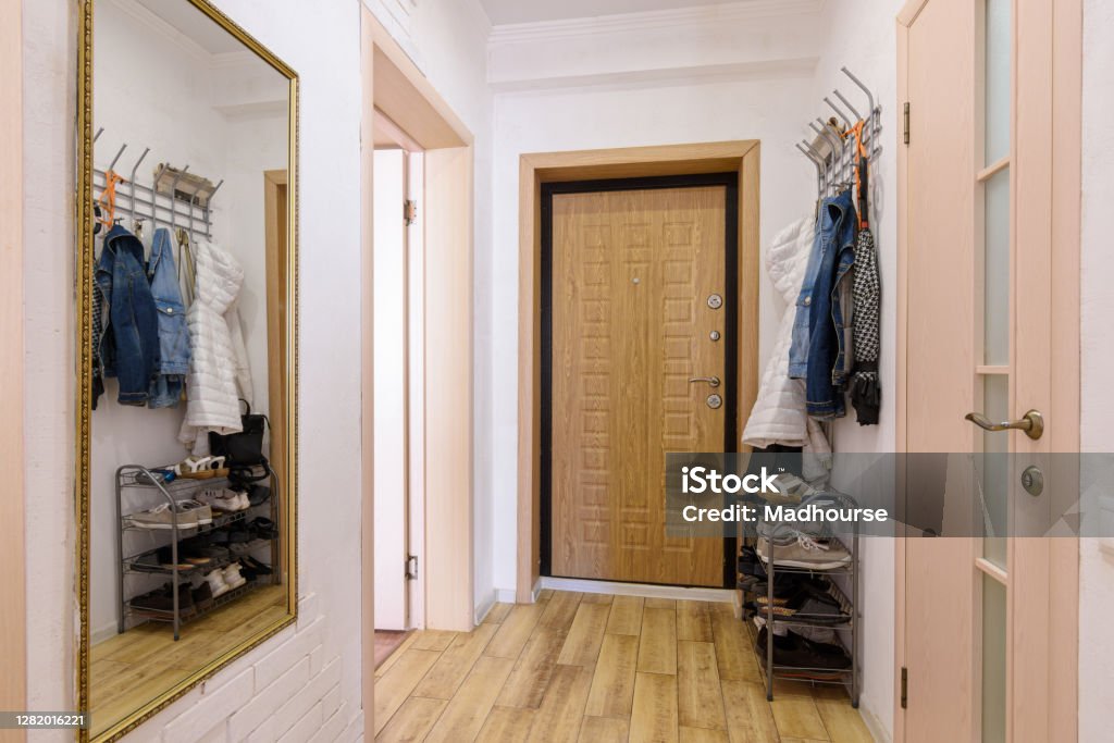 The interior of a habitable hallway in a small one-room apartment Entrance Hall Stock Photo