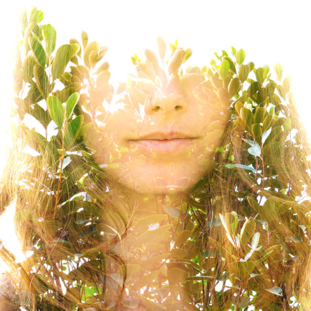 istock Young woman double exposure portrait with leaves 1282017331