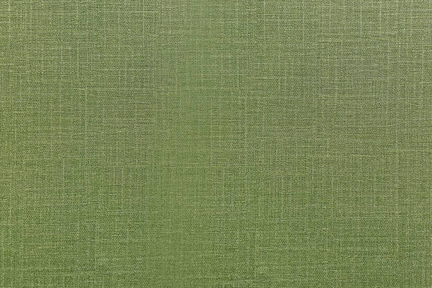 superficie de textura de tela verde para el diseño textil de pared interior. - cotton smooth green plant fotografías e imágenes de stock