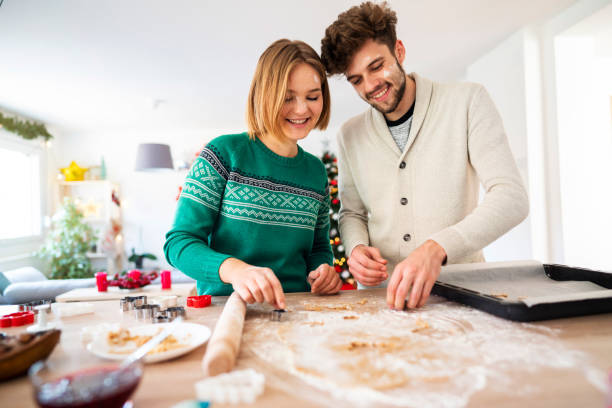 istock Smiling young couple baking together for Christmas 1282018925