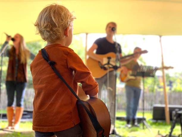 istock Father and toddler son on guitar 1282020764