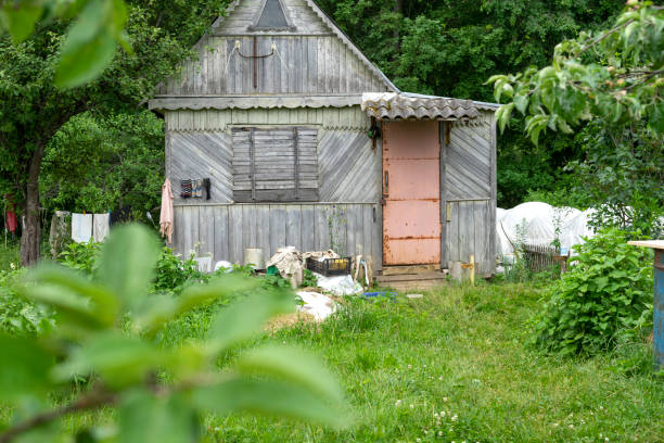 istock old ramshackle cottage on a summer day 1282025555