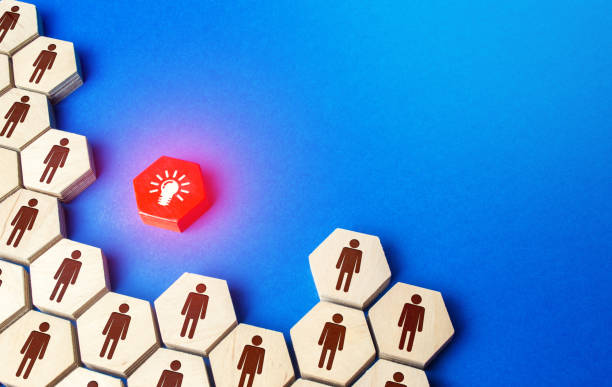 istock People structure grouping around idea. A collective national idea, striving for integrity and excellence. Cooperation, teamwork. Strength in unity. Achieving goal. The result of joint work. Brainstorm 1282026660