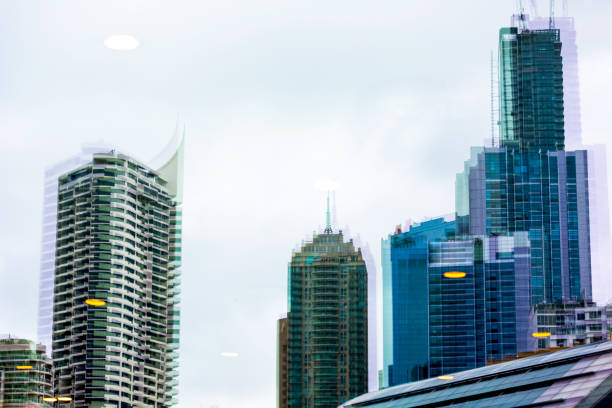 istock Reflection of office buildings on glass wall, background with copy space 1282028487