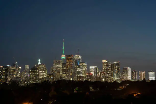 Night view of Toronto City Skyline from Riverdale Park in Ontario Canada