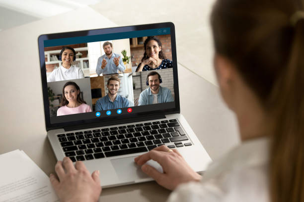 istock Female employee talk on video call with diverse colleagues 1282034978