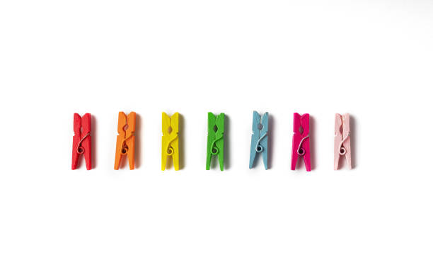 istock Set of multicolored wooden pins on white background. 1282035307